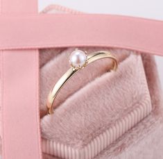 Akoya Pearl Crown Ring, Vintage Pearl Engagement Rings, Dainty Real Pearl Ring, Princess Tiara Promise Rings, Single Pearl Casual Rings ✧･ﾟ: *✧･ﾟ:* Welcome to Charles Davin Jewelry*:･ﾟ･ﾟ✧ ✶Material: 10K/ 14K/ 18K ✶Main Stone: Natural Akoya Pearl; 4mm ✶Side Stone: - ✶Width of band: 1.6mm ✶Thickness of band: 1.2mm PRODUCTION TIME My team of jewelry artisans and I are ecstatic and cannot wait to share our passion, joy and creativity with you! Our jewelry are completely crafted by hand from scratch Yellow Gold Pearl Birthstone Ring For Promise, Yellow Gold Pearl Promise Ring With Birthstone, Delicate Bezel Set Wedding Rings, Delicate Wedding Rings With Bezel Setting, Delicate Round Birthstone Ring For Formal Occasions, Elegant Pearl Ring With Birthstone, Wedding Pearl Ring With Bezel Setting, 14k Gold Pearl Ring With Prong Setting, Elegant Couple Rings With Prong Setting