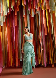 Mint green pre-draped ruffle sari in georgette. It has mini ruffle detailing at the palla and is paired with a hand embroidered 3D organza flowers blouse in net. Flower Blouse, Organza Flowers, 3d Flowers, Custom Tailoring, Asian Fashion, Mint Green, Hand Embroidered, Custom Sizing, Mint