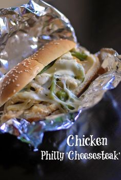 a chicken philly cheese steak sandwich in foil