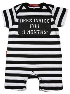 a black and white striped baby romper with the words been inside for 9 months