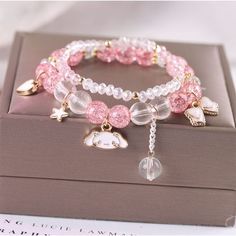 Kawaii Anime Melo Kuro Crystal Bracelet This Kawaii Anime Melo Kuro Crystal Bracelet combines cuteness and elegance with its delicate crystals. Adorn your wrist with this charming accessory and add a touch of uniqueness to any outfit. Perfect for any anime lover, this bracelet will surely be an eye-catching addition to your jewelry collection. Anime Bracelet, Kawaii Bracelet, Girly Bracelets, Ethereal Jewelry, Shells Recipe, Candy Bracelet, Products Photography, Kuromi Cinnamoroll, Parcel Delivery