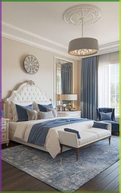 a bedroom with blue and white decor in the corner, along with a chandelier