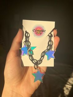 FREE Shipping on orders $35 and up! Star Girl Choker The Star Girl choker is made with high-quality lightweight material, perfect for raves and festivals! The iridescent star charms shine and reflect prisms of light under the sun.  - Charms are made with lightweight iridescent acrylic- color appearance changes depending on lighting - Adjustable from 14 to 16 inches (message me for length customizations up to 20-22inches) Matching earrings here!-  https://www.etsy.com/listing/1380601428/star-irid Rave Multicolor Choker For Festivals, Adjustable Rave Choker For Festival, Rave Jewelry, Girls Choker, Iridescent Acrylic, Rave Accessories, Festival Earrings, Festival Accessories, Rave Festival