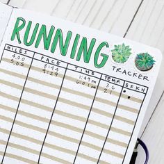 a close up of a planner with the words running on it