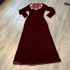 Vintage Red Velvet Maxi Dress With Crochet Trim. In Great Condition- Minor Wear. Chest: 16” Across Front, Waist: 13” Across Front, Hips: 17” Across Front, Length: 60”, Arm Length: 25”. Fitted Burgundy Festive Dress, Festive Fitted Burgundy Dress, Red Festive Costume Dress, Festive Red Costume Dress, Fitted Red Vintage Dress For Evening, Vintage Burgundy Winter Dresses, Red Velvet Maxi Dress, Velvet Maxi Dress, Velvet Maxi