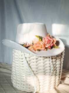 "Say hello to all your summer festivities this year with our unique lacy bohemian cowgirl hat! This chic structured cowboy hat is beautifully crafted with delicate white lace adding the perfect feminine touch and adorned with beautiful peachy florals for that ultimate bohemian desert look. It's the perfect unique accessory to complete your festival outfit or your next elopement/engagement shoot! High quality and thick string tie is included to secure your hat around your head. You can wear it on your head and/or tie behind your neck for versatile looks. Dimensions: Brim to Brim : 14\" Long x 12\" Wide x 5\" High Inside Head Slot: 8\" Long x 6.5\" Wide x 4.75\" High" Spring White Hat Band For Ranch, White Hat Bands For Spring Ranch, White Hat Band For Spring Ranch Occasions, White Wide Brim Costume Hat For Festival, White Wide Brim Festival Hat, White Western Straw Hat For Spring, Flat Brim Hats For Western-themed Spring Events, White Western Hat For Spring, Rustic Adjustable Hat Bands For Spring