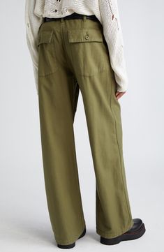 These utility pants are cut in a wide-leg silhouette from Japanese surplus military sateen that's slubbed and treated with an enzyme wash for softness. 32 1/2" inseam; 22" leg opening; 13 1/2" front rise; 17" back rise (size 29) Button fly Front slant pockets; back button-flap patch pockets 100% cotton Machine wash, dry flat Imported SPACE: A shop for emerging and advanced designers Khaki Wide Leg Relaxed Fit Jeans, Olive Wide Leg Relaxed Fit Pants, Washed Cotton Wide Leg Pants, Utility Wide Leg Pants With Relaxed Fit, Relaxed Fit Wide Leg Utility Pants, Utility Style Relaxed Fit Wide Leg Pants, Casual Olive Wide Leg Pants With Pockets, Utility Style Wide Leg Washed Bottoms, Utility Straight Leg Washed Pants