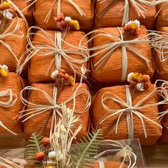 many orange wrapped presents are on display