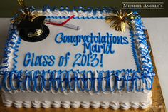 a graduation cake with blue and white frosting on it that says congratulations mardi gras of 2013