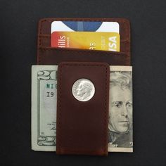 You are looking at a gorgeous Magnetic Money Clip and Wallet Combo, set with an authentic United States 1946 ~ 1964 Roosevelt Dime 90% Silver 10 Cent Coin. The coin is average circulated and in great condition. You need to pick a year from pull-down menu. The wallet is about 4.25"(108 mm) x 3.00"(75 mm), made of high quality Crazy Horse Water Buffalo Leather, brown color, brand new and has never been used before. It features a magnetic money clip with two card slots in front, four card slots on Vintage Trifold Wallet With Coin Pocket For Travel, Vintage Trifold Wallet With Rfid Blocking For Travel, Retro Bifold Wallets With Coin Pocket, Vintage Trifold Wallet With Coin Pocket, Classic Everyday Coin Purse, Vintage Trifold Wallet With Rfid Blocking For Daily Use, Everyday Vintage Wallet With Rfid Blocking, Classic Rfid Blocking Coin Purse Gift, Classic Rfid Blocking Coin Purse