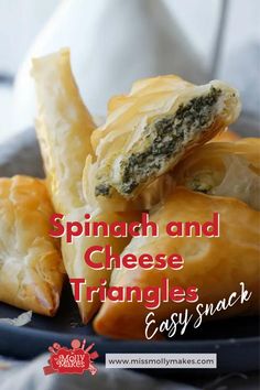 spinach and cheese triangles on a plate with text overlay reading spinach and cheese triangles easy snack