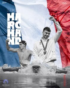 two men are sitting in the water holding up their medals