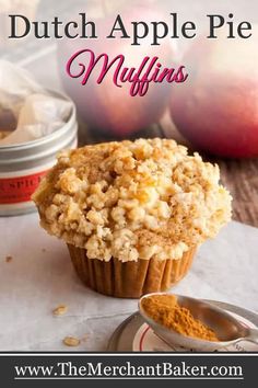 an apple pie muffin is sitting on a table with apples in the background and text overlay that reads, dutch apple pie muffins