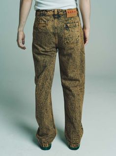 Brown marble dyed denim trousers.    cotton    model wears size Brown Cotton Flare Jeans With Five Pockets, Brown Streetwear Jeans With Five Pockets, Brown Jeans With Five Pockets For Streetwear, Brown Jeans With Hip Pockets For Streetwear, Faded Five-pocket Pants For Fall, Brown Wide Leg Jeans With Hip Pockets, Fall Faded Straight Leg Pants, Faded Straight Leg Pants For Fall, Acid Wash Mid-rise Bottoms For Fall