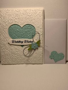 two cards with the words wedding wishes written on them, one has a heart shaped card and