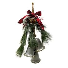 two bells with pine cones and bows hanging from a rope