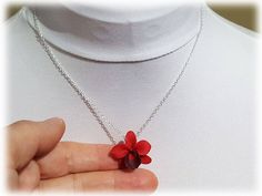 Petite hand sculpted (2.5cm) 1 inch red orchid necklace. The handcrafted orchid pendant drops from on a hand wired bail. Available on silver gold or antique brass styles. -Original hand sculpted polymer clay flowers -Durable, water-resistant -No molds, no paint, no glue -Flower size : 2.5cm Flower (about 1 inch, size of a quarter) -Chain Length : Select 16 inch or 18 inch cable chain -Style : Select Silver-plated, Gold-plated, Antique Brass, 925 sterling Silver or 14k Gold Filled View matching c Unique Orchid-colored Jewelry Gift, Unique Orchid-colored Jewelry As A Gift, Unique Orchid Colored Jewelry For Gift, Unique Red Flower-shaped Jewelry, Unique Orchid Jewelry For Gift, Unique Red Flower Jewelry, Unique Red Flower Shaped Jewelry, Orchid Flower Pendant Jewelry Gift, Orchid Flower Pendant Jewelry For Gift