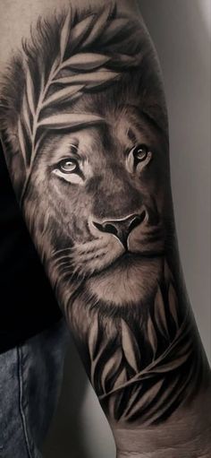 a man's arm with a lion tattoo on it, and an arrow in the middle