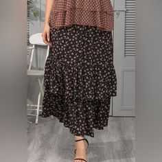 Sizing Category: Plus Pattern Type: Floral Style: Casual Features: Layered Length: Maxi Material: 100% Polyester Stretch: No Stretch Sheer: No Body: Not Lined Care Instructions: Hand Wash Cold. Do Not Tumble Dry. Imported Product Measurements: Xl: Length 37 In, Waist 33-49 In, Hip 51 In 2xl: Length 37 In, Waist 35-51 In, Hip 53 In 3xl: Length 38 In, Waist 37-54 In, Hip 55 In 4xl: Length 38 In, Waist 40-56 In, Hip 58 In 5xl: Length 39 In, Waist 42-59 In, Hip 60 In **Expect 5-10 Business Days For Black Floral Print Tiered Skirt, Bohemian Black Skirt With Floral Print, Black Floral Print Tiered Maxi Skirt, Layered Maxi Skirt, Floral Style, Ditsy Floral, Maxi Skirt, Black And Brown, Style Casual