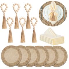 a table setting with place settings, napkins and tassels on the plates