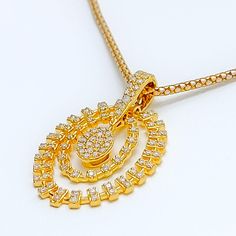 This 18k yellow gold pendant, weighing 4.6 grams, features a charming dangling oval design adorned with 0.61 carats of round brilliant cut diamonds. The diamonds, with a G-H color and VS clarity, add exceptional brilliance and elegance. Measuring 1.25 inches in length, this pendant is perfect for adding a touch of sophistication to any outfit. Please note that the chain is not included. Ideal for those who appreciate luxurious and timeless jewelry, this pendant adds a touch of refined charm to a Yellow Gold Pendants, Timeless Jewelry, Oval Diamond, Round Brilliant Cut Diamond, Round Brilliant, Gold Pendant, Elegant Design, 18k Gold, Diamonds