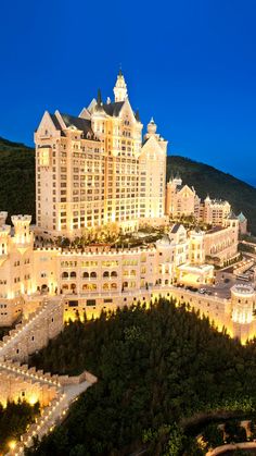 an aerial view of the grand hotel and spa in macau, china at night time