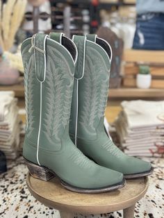 Gorgeous mint green style cowboy boots Ciel gumuza full grain leather Shaft height: 12" Heel: 1 1/2 Snip toe style and easy pull on Leather lining and cushioned footbed White boot stitch shaft embroidery Leather outsole Fits true to size White Cowboy Boots Wedding, Style Cowboy Boots, Wedding Cowboy Boots, Liberty Black Boots, White Cowboy Boots, Girl Cowboy Boots, Silver Boots, Sage Dress, Green Boots