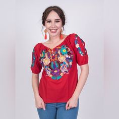 Gorgeous Blouse Beautifully Machine Embroidered With Silk Thread In The Chest Area And The Sleeves. It Has An Elastic Band On The Neckline And Sleeves. Comfortable Fit, Great As An Everyday Outfit Or For A Special Occasion. Every Top Is One Of A Kind, You Will Receive The Same Color Of Fabric And Style, But The Embroidery Patterns And Colors May Vary. Bohemian Red Tops With Floral Embroidery, Red Floral Embroidered Top, Summer Red Tops With Embroidered Neckline, Red Summer Top With Embroidered Neckline, Casual Red Blouse With Floral Embroidery, Summer Red Top With Embroidered Neckline, Red Embroidered Short Sleeve Top For Spring, Red Top With Embroidered Neckline For Summer, Casual Red Embroidered Short Sleeve Top