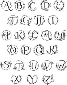 an old english alphabet with the letters and numbers drawn in black ink on white paper