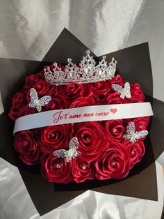 a bouquet of red roses with a tiara on top that says it's time for me to grow