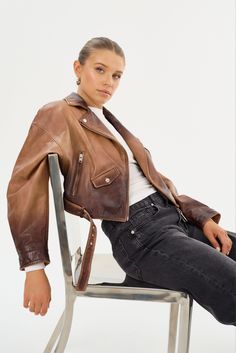 Sometimes, there's no better feeling than commanding the room. Bring back the best of the 80s with this vintage-inspired cropped leather jacket. Featuring classic biker elements and unexpected stand-outs like shoulder pads and balloon pleated sleeves, you'll stand out from the rest when you rock the Dylan. A coin flap pocket and a removable waist belt add unique touches to this lamb leather stunner. A true statement piece, this 80s leather jacket is an instant head-turner. Cropped Leather Jacket, Pleated Sleeves, Leather Biker Jacket, You Rock, Swim Accessories, The 80s, Bring Back, Biker Jacket, Waist Belt