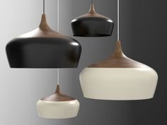 three hanging lights with different shapes and colors