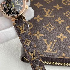 This stylish timepiece is a Louis Vuitton Tambour Chronometer. It showcases a distinctive black dial with contrasting silver and yellow accents. The chronograph sub-dials and 24-hour bezel add functionality, while the date window at 4 o'clock enhances practicality. The watch's stainless steel case with polished pushers and crown complements the luxurious Monogram canvas strap, creating a cohesive and sophisticated design. The caseback proudly displays the Louis Vuitton monogram and "Swiss Made" Brown Aesthetic Louis Vuitton, Mixed Family, Mixed Families, Buy Louis Vuitton, Yellow Accents, Loafer Sneakers, Bottega Veneta Shoulder Bag, Sophisticated Design, Swiss Made