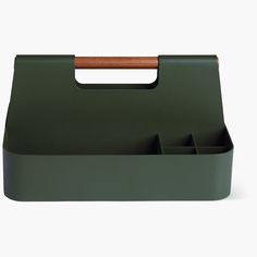 a green box with three compartments and a wooden handle