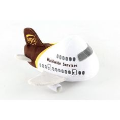 a stuffed toy airplane with the words world wide services on it