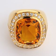 Mens Rings, Natural Citrine Men's Ring, Huge Golden Champagne Citrin 21 Cts 14K Yellow Gold Ring - Features high-grade huge natural golden Citrine; - The stone shape: cushion cut / 21 CT (17mm x 19mm); - Citrine color: AAA Golden Champagne; - The setting features 36 natural white sapphire; - The ring is made of solid sterling silver; - 925 hallmark stamp is inside the shank; - Covered with 14K yellow gold, 3 microns thick; - Ring weight: approximately 21 grams; - Ring face size: 24 mm x 29 mm - Formal Gold Signet Ring With Accent Stones, Gold Signet Ring With Accent Stones For Formal Occasions, Orange Rings With 17 Jewels For Gift, Gold Signet Ring With Accent Stones For Anniversary, Anniversary Gold Signet Ring With Accent Stones, Orange Polished Wedding Rings, Golden Champagne, 21 Grams, Thick Ring