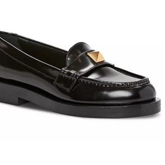 Valentino Garavani Women's Roman Stud Moc Toe Loafers Black Leather Loafer With Gold Stud Detail Fits True To Size, Order Your Normal Size Almond Moc-Stitch Toe Slip On Signature Pyramid Stud Detail At Instep Leather Upper, Lining And Sole Made In Italy Luxury Black Moccasins For Work, Designer Black Loafers For Work, Luxury Formal Flats For Fall, Designer Pointed Toe Loafers For Work, Classic Formal Loafers With Studded Rubber Outsoles, Chic Formal Loafers With Studded Rubber Outsoles, Designer Black Moccasins For Work, Designer Brogue Loafers For Office, Designer Office Moccasins With Round Toe