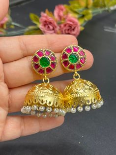 We bring beautiful Jewelry sure to elevate any look! Kindly pay attention to all photos and video and ask questions about the item prior to ordering. Green Handmade Jhumkas For Festivals, Handmade Green Chandbali Jhumkas, Green Round Temple Jewelry Jhumkas, Handmade Green Festive Jhumkas, Festive Handmade Green Jhumkas, Traditional Handmade Green Jhumkas, Green Peacock Design Jhumkas For Festive Occasions, Handmade Green Round Jhumkas, Green Peacock Design Jhumkas For Diwali