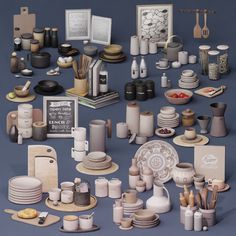 an assortment of pottery is displayed on a blue surface with white and black accents,