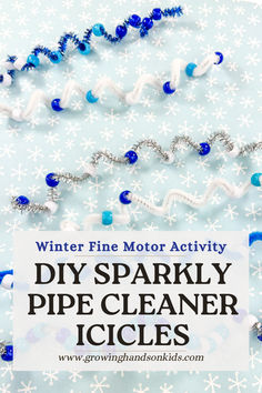 DIY Sparkly Pipe Cleaner Icicles craft project displayed on a snowy background with blue and silver beads threaded onto white and metallic pipe cleaners, accompanied by the text 'Winter Fine Motor Activity: DIY Sparkly Pipe Cleaner Icicles' and a website URL 'www.growinghandsonkids.com'. Pipe Cleaner Winter Crafts, Icicle Crafts For Kids, Christmas Crafts For Toddlers Preschool, Snow Preschool, 3s Preschool, Winter Fine Motor, Icicle Crafts, Bead Threading, December Preschool