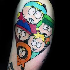 a cartoon tattoo on the arm of a man with many faces and different hair colors