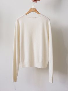 White Fine Knit Cashmere Cardigan, Cream Cashmere Long Sleeve Cardigan, Cream Wool Fine Knit Cardigan, Classic Cream Cardigan For Layering, White Fine Knit Crew Neck Cardigan, White Crew Neck Fine Knit Cardigan, Beige Crew Neck Soft Knit Cardigan, Everyday Soft Knit Crew Neck Cardigan, White Cashmere Everyday Sweater