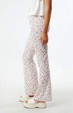 Step into springtime elegance with the Floral Knit Flare Pants from LA Hearts, showcasing delicate pointelle knit fabric adorned with a vibrant floral print. Designed with a flattering mid-rise fit, an elastic waistband, and flared leg openings, they effortlessly combine comfort and style for a chic and feminine look.


	10" rise
	31" inseam
	Mid-rise
	Floral print
	Elastic waistband
	Flared leg openings
	Model is wearing a size small
	Model measurements: 5’10” height, 31” bust, 23.5” waist, 34.5” hips Knit Flare Pants, Heeled Rain Boots, High Heel Rain Boots, Pointelle Knit, Floral Knit, Trouser Pants Women, Floral Leggings, Feminine Look, Lounge Pants