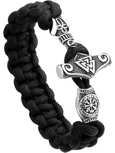 a black rope bracelet with an anchor, cross and compass charm on the end of it