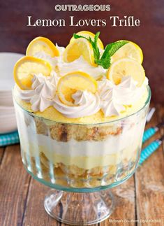 lemon lovers trifle in a glass dish on a wooden table