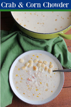 a bowl of corn chowder next to a pot of soup on a table with green cloth