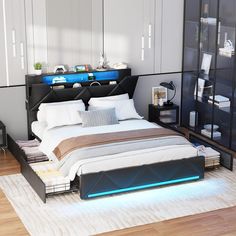 a bed with white sheets and blue lights on it's headboard in a bedroom