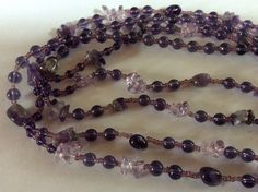 Pretty 2 Stranded Amethyst colored Beaded Necklace Handmade Purple Multi-strand Beads, Purple Multi-strand Beads For Jewelry Making, Adjustable Beaded Purple Crystal Necklace, Adjustable Purple Beaded Crystal Necklace, Bohemian Lavender Beaded Crystal Necklace, Amethyst Beaded Necklaces With Round Beads, Purple Necklaces With Round Stone Beads, Purple Beaded Crystal Necklaces For Party, Purple Necklace With Round Stone Beads