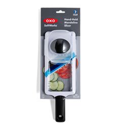 oxo hand held measuring spoon with retractable handle, black and white handles