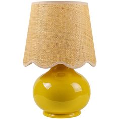 a yellow table lamp with a beige shade